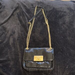 Gently Used in Good Condition Michael Kors Black  Snake Print Crossbody Bag
